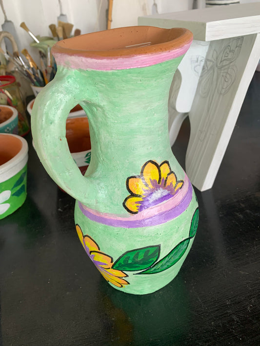 Handpainted terra cotta jug